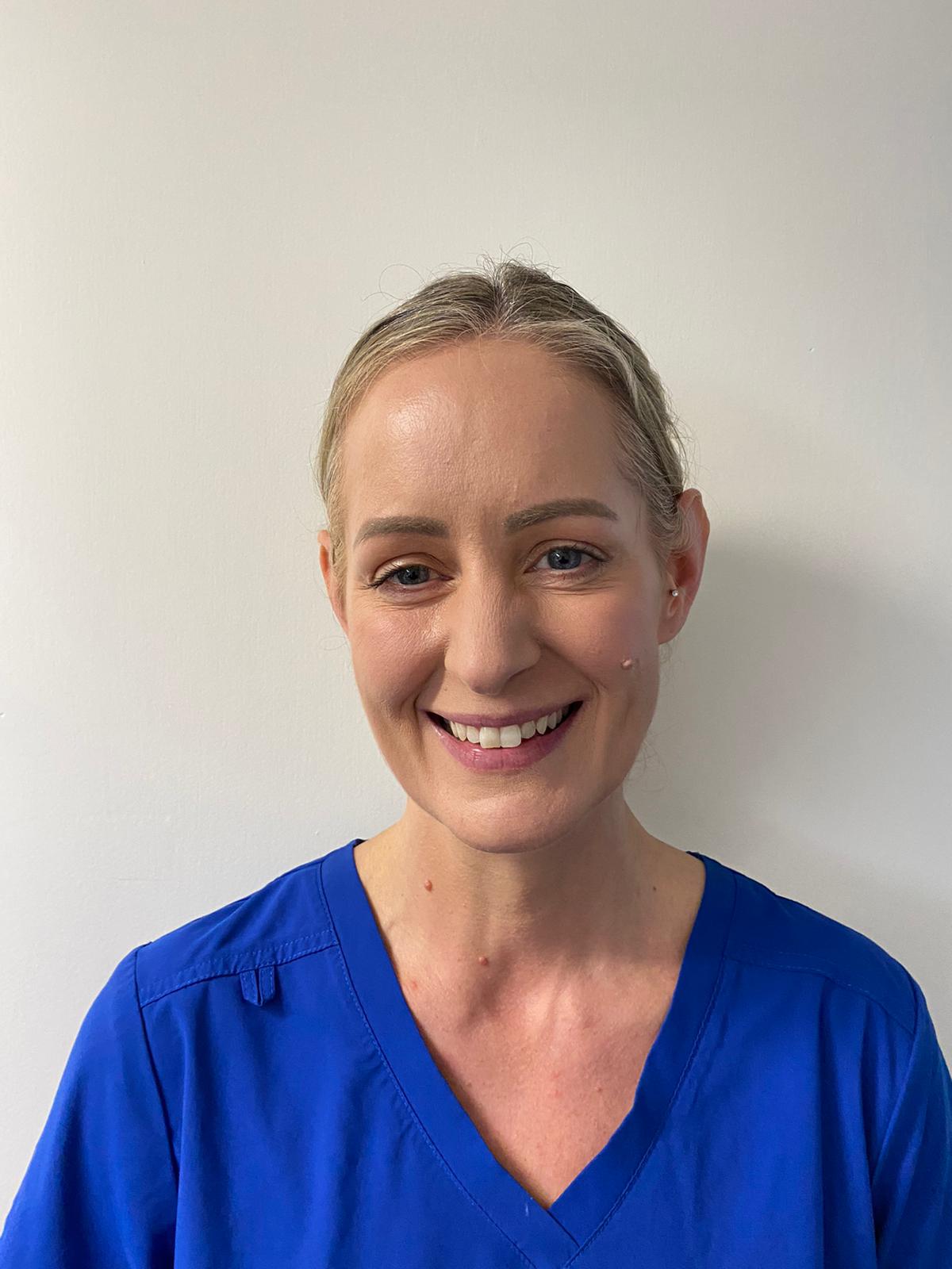 member Dr. Suzanne McDonnell